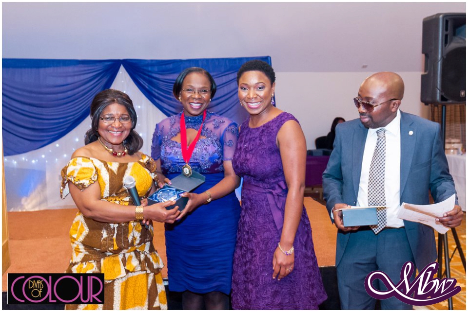 Cllr Pat Ekechi, Cllr Anna Mbachu receiving her Women of Honour award and  Faustina